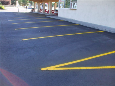 parking lot paving experts edmonton - asphalt blacktop parking lot with yellow lines 